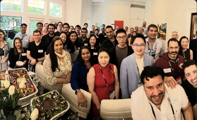 A packed MITAS hub night group photo