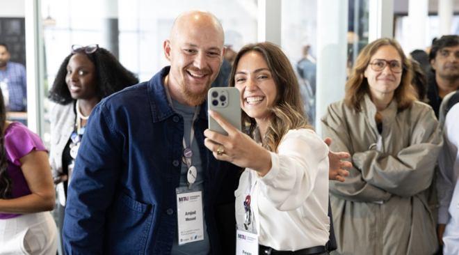 Founders taking a selfie at the MIT AI Conference